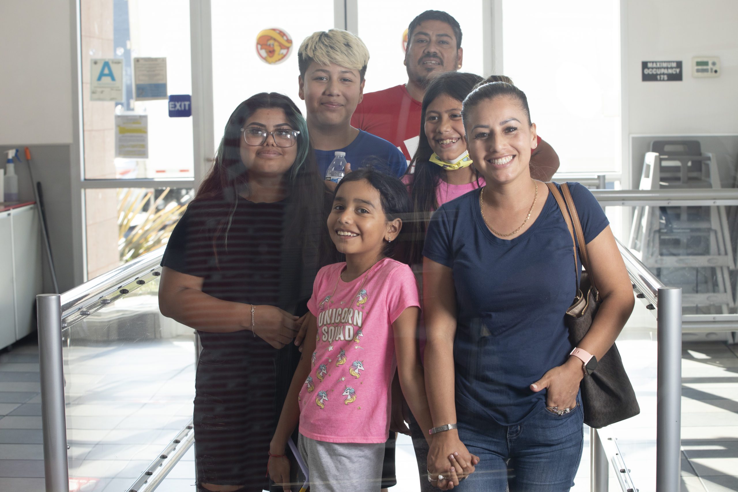 Happy family visiting the best tacos in Los Angeles.