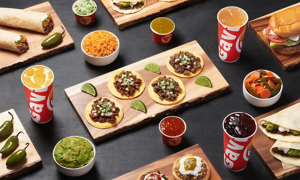 Tacos Gavilan authentic Mexican spread with tacos, burritos, and fresh salsas
