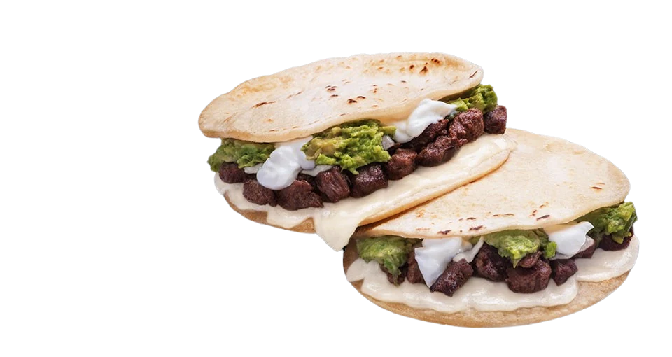 Super Mulita with sour cream and guacamole