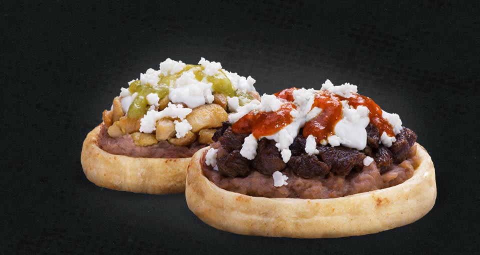 Los Sopes - Two sopes, asada and chicken, with salsa